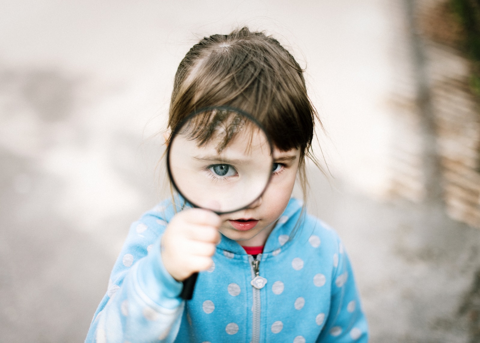 Photo by Elizaveta Dushechkina girl in blue and white polka dot jacket